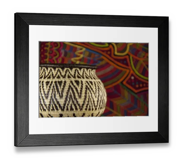 Framed Print : Traditional hand made Panamanian handicrafts. Embera Indian grass basket in front Framed Print : Traditional hand made Panamanian handicrafts. Embera Indian grass basket in front