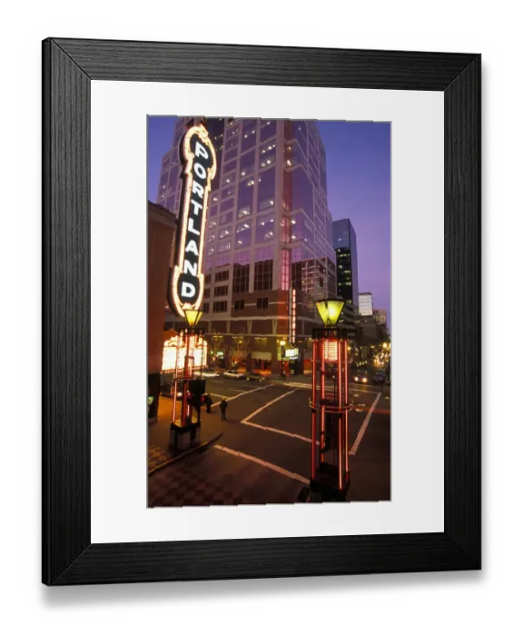 Framed Print : USA, Oregon, Portland, Cars streak by the Arlene Schnitzer Concert Hall and the Fox Tower