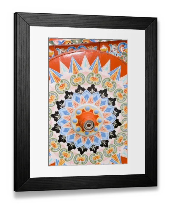 Framed Print : Colorful close up of famous wheel for carriages that are traditional in and around