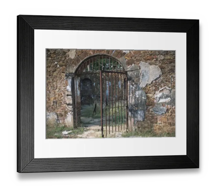 Framed Print : Barred Iron Gate to Prison Complex; Ile Royale; Devils Islands, French Guiana Framed Print : Barred Iron Gate to Prison Complex; Ile Royale; Devils Islands, French Guiana