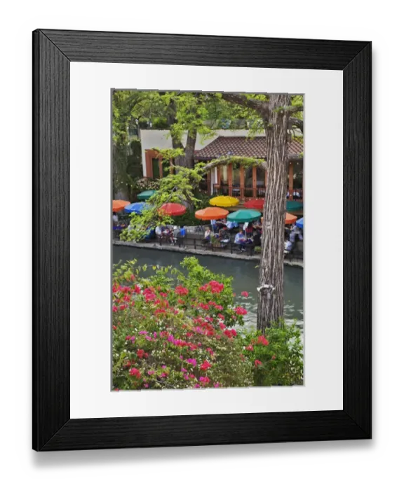 Framed Print : Tourists dining in outdoor cafe under colorful umbrellas on the famous River Walk Framed Print : Tourists dining in outdoor cafe under colorful umbrellas on the famous River Walk