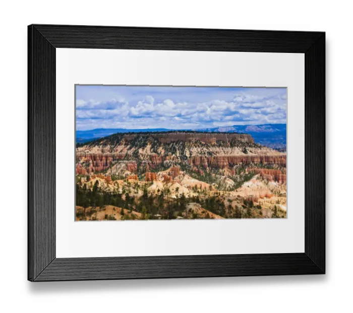 Framed Print : Hoodoos protect a distand mesa in Bryce Canyon - Bryce National Park, UT Framed Print : Hoodoos protect a distand mesa in Bryce Canyon - Bryce National Park, UT