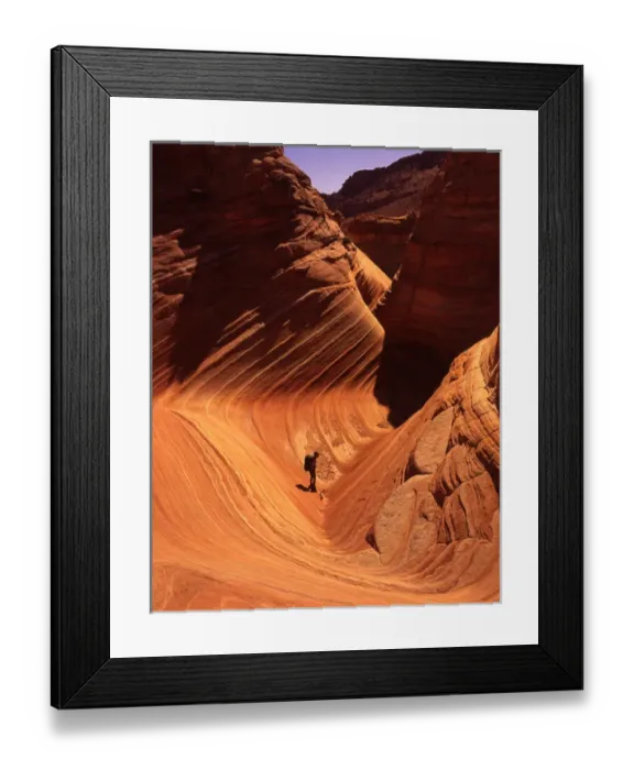 Framed Print : Hiker enjoys swirling Navajo Sandstone, Vermillion Cliffs area, Arizona Framed Print : Hiker enjoys swirling Navajo Sandstone, Vermillion Cliffs area, Arizona