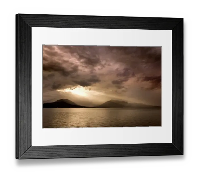 Framed Print : USA, Washington, Seabeck. God rays shine through dark clouds over Hood Canal. Credit as