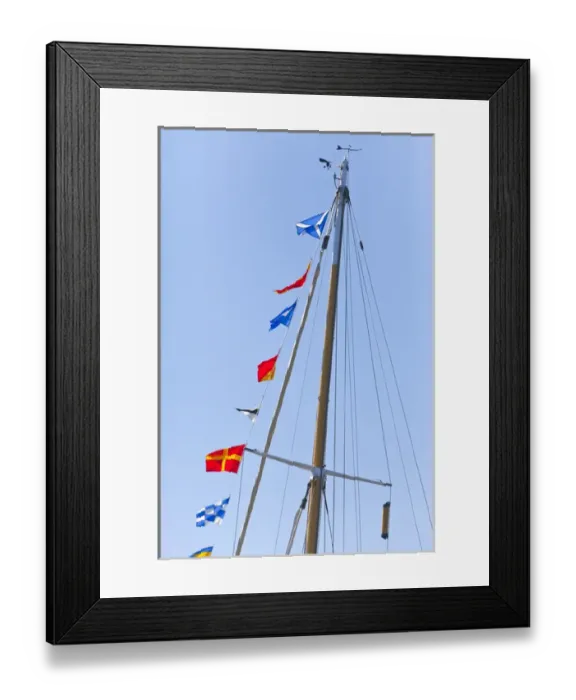 Framed Print : USA, Washington, Port Townsend. Sailboat mast flying semaphore flags at a Wooden Boat Show Framed Print : USA, Washington, Port Townsend. Sailboat mast flying semaphore flags at a Wooden Boat Show