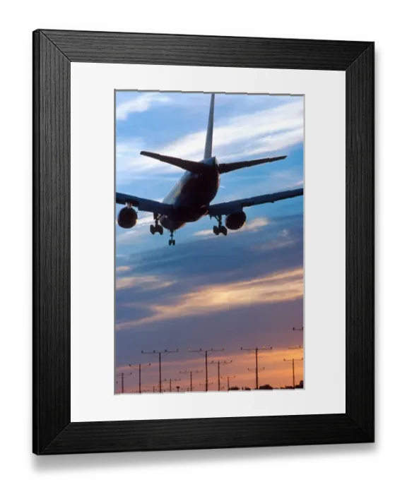 Framed Print : Airplane landing at LAX airport in Los Angelas, California at sunset Framed Print : Airplane landing at LAX airport in Los Angelas, California at sunset
