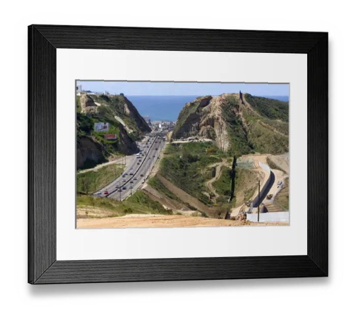 Framed Print : Construction of the border fence that prevents illegal immagrant crossings at the U Framed Print : Construction of the border fence that prevents illegal immagrant crossings at the U