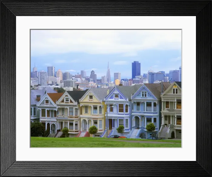 Framed Print : A row of vintorian homes typify San Franciscos funky and elegant reputation