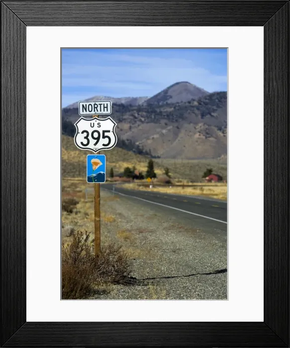 Framed Print : An upward view of a Highway 395 North sign post including a California Scenic Highway