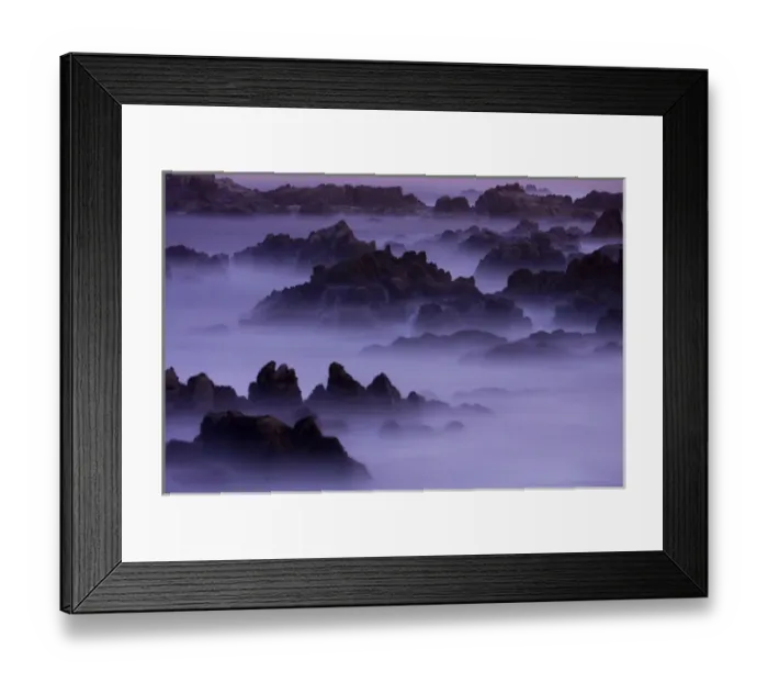 Framed Print : Surf pours over the California coastline at dusk