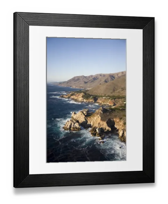 Framed Print : USA. California. Big Sur. Ragged and rough cliffs drop down to the sweeping coastline Framed Print : USA. California. Big Sur. Ragged and rough cliffs drop down to the sweeping coastline