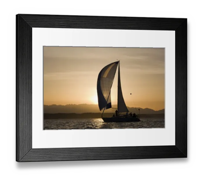 Framed Print : USA, Washington, Seattle, Setting sun lights yacht sailing in Elliot Bay on spring