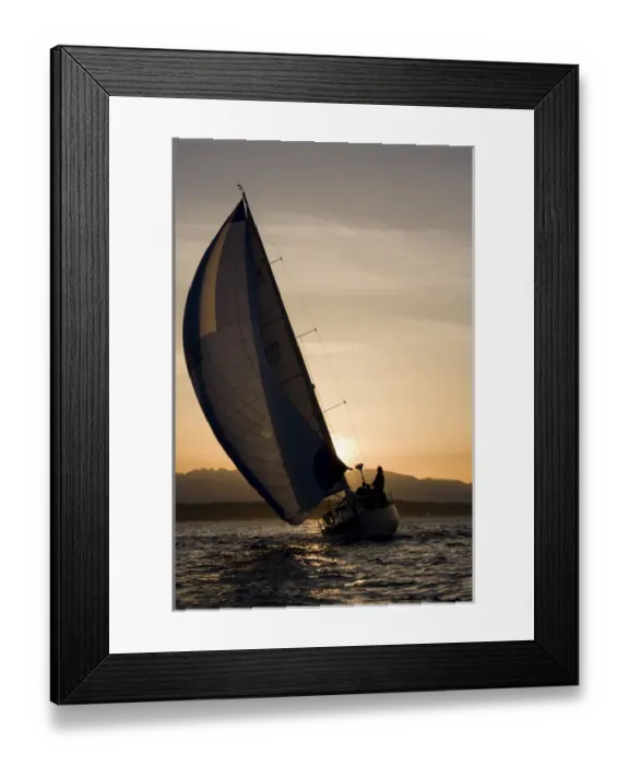 Framed Print : USA, Washington, Seattle, Setting sun lights yacht sailing in Elliot Bay on spring