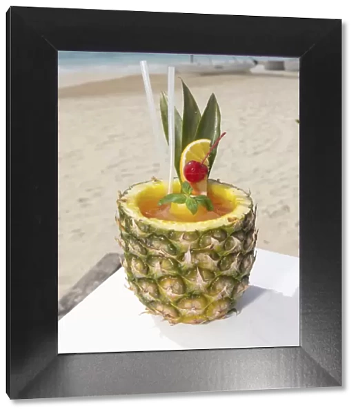 Rum Punch in pineapple