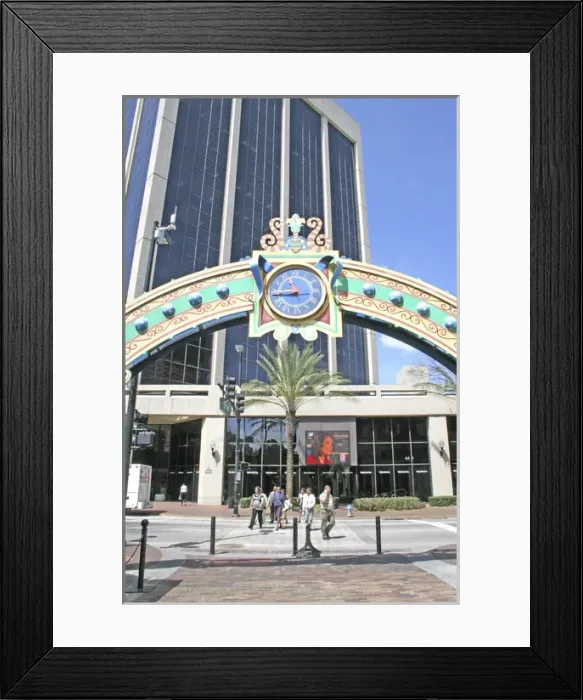 Framed Print : Clock in arch over Wall Street Pedestrian mall downtown Orlando Florida Framed Print : Clock in arch over Wall Street Pedestrian mall downtown Orlando Florida