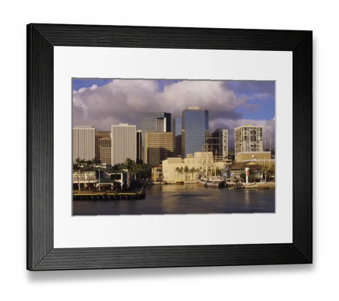 Framed Print : Modern skyscrapers contrast with vintage sailing ships of a bygone era in Honolulu harbor Framed Print : Modern skyscrapers contrast with vintage sailing ships of a bygone era in Honolulu harbor