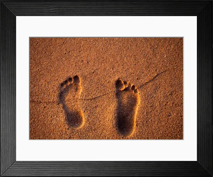 Framed Print : Footprints in the sand on a Kauai beach, in Hawaii