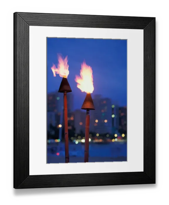 Framed Print : Hawaii Lit torches with skyline in background Framed Print : Hawaii Lit torches with skyline in background