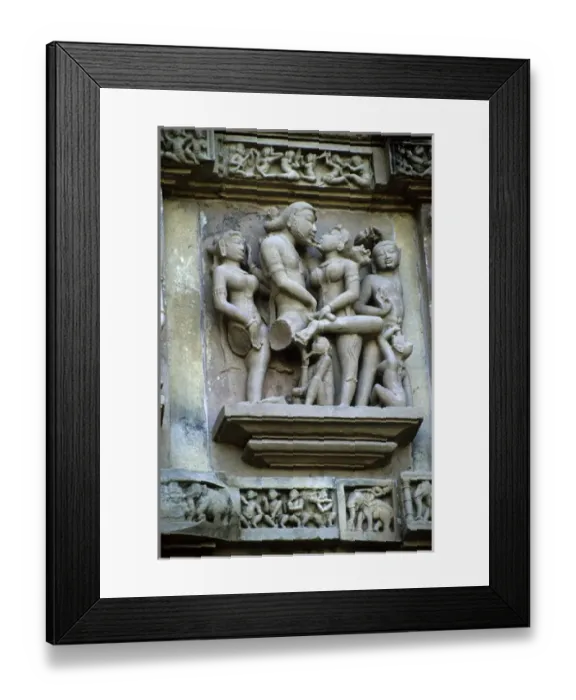 Framed Print : Asia, India, Khajuraho. Erotic carved figures remind visitors to leave sexual or