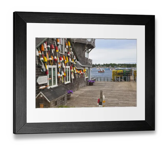 Framed Print : Colorful lobster buoys hang from harbor deck in Bernard, Maine, USA Framed Print : Colorful lobster buoys hang from harbor deck in Bernard, Maine, USA