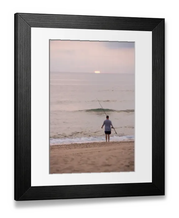 Framed Print : Early morning surfcasting on the beach at Cape Cod National Seashore in Massachusetts
