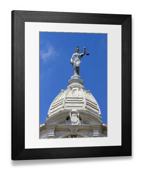 Framed Print : Lady Justice depicted with a sword and scales atop the Ionia County Courthouse in Ionia Framed Print : Lady Justice depicted with a sword and scales atop the Ionia County Courthouse in Ionia