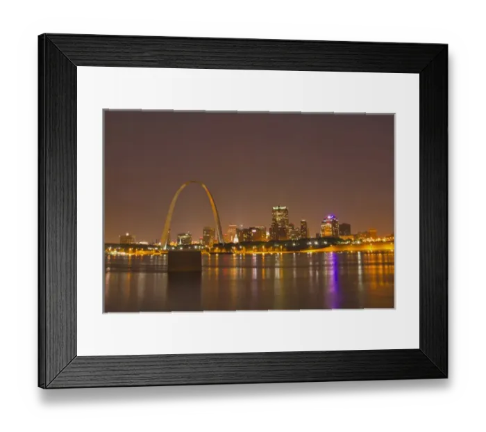 Framed Print : The Gateway Arch and St Louis skyline reflect into the Mississippi River at dusk in St Louis Framed Print : The Gateway Arch and St Louis skyline reflect into the Mississippi River at dusk in St Louis