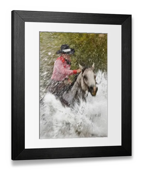 Framed Print : Slow motion view of cowgirl riding through water, Montana Framed Print : Slow motion view of cowgirl riding through water, Montana