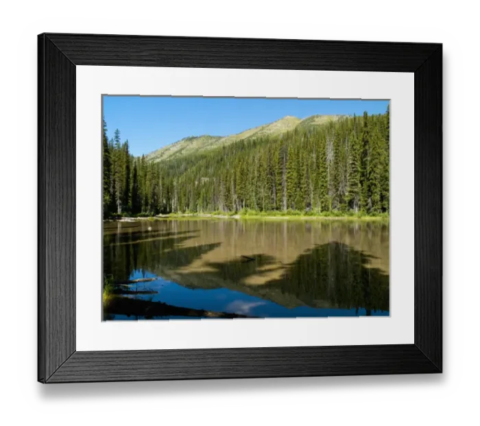 Framed Print : Frozen Lake located on the U. S. and Canadian border in the Flathead National Forest Framed Print : Frozen Lake located on the U. S. and Canadian border in the Flathead National Forest