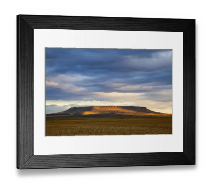 Framed Print : Morning sunlight breaks through the cloud cover and illuminates Square Butte near Great Falls Framed Print : Morning sunlight breaks through the cloud cover and illuminates Square Butte near Great Falls