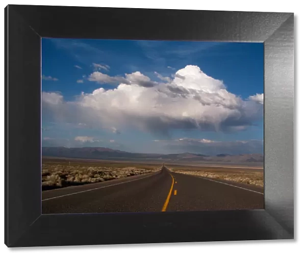 NEVADA. USA. Cumulus clouds over US Highway 50. The Loneliest Road in America'