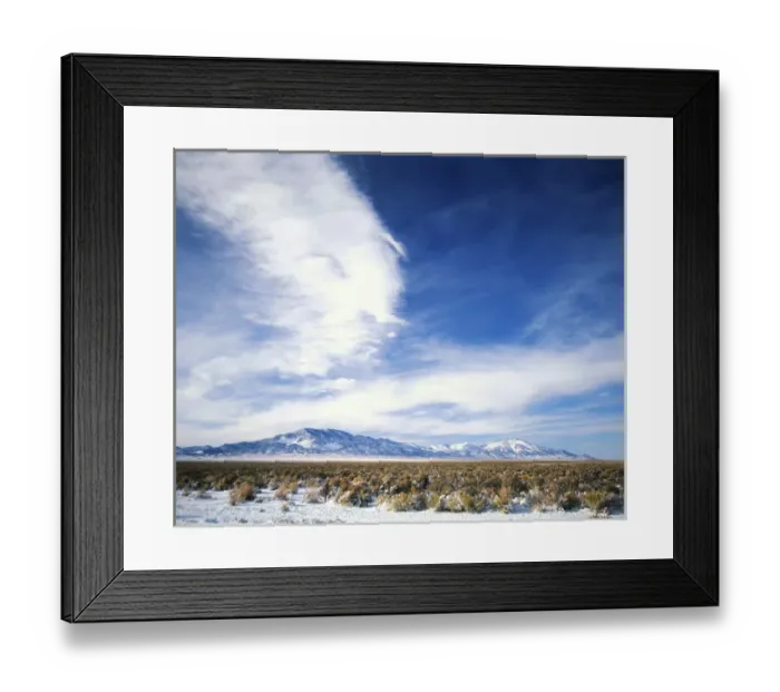 Framed Print : NEVADA. USA. Cirrus clouds above Spring Valley & Schell Creek Range in early winter Framed Print : NEVADA. USA. Cirrus clouds above Spring Valley & Schell Creek Range in early winter
