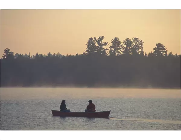 Canoeing. Umbagog Lake. Mist. Northern Forest. Errol, NH