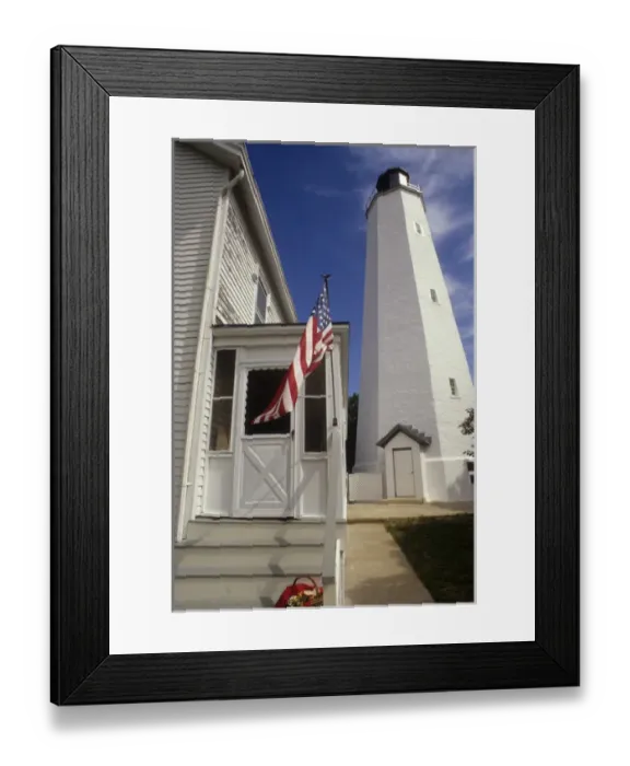 Framed Print : New Jersey: Gateway National Recreation Area, Sandy Hook LIghthouse (built 1764) with American flag Framed Print : New Jersey: Gateway National Recreation Area, Sandy Hook LIghthouse (built 1764) with American flag
