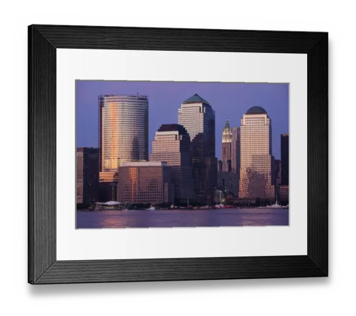 Framed Print : USA, New York, New York City, Setting sun reflects off building windows on Manhattan skyline