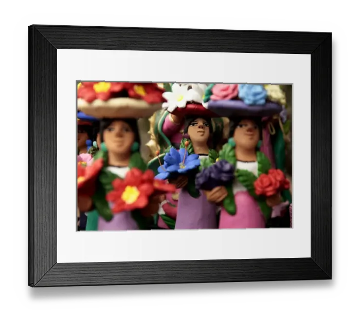 Framed Print : Santa Fe, New Mexico, United States. Clay Mexican women with flowers. Oxacan style Framed Print : Santa Fe, New Mexico, United States. Clay Mexican women with flowers. Oxacan style