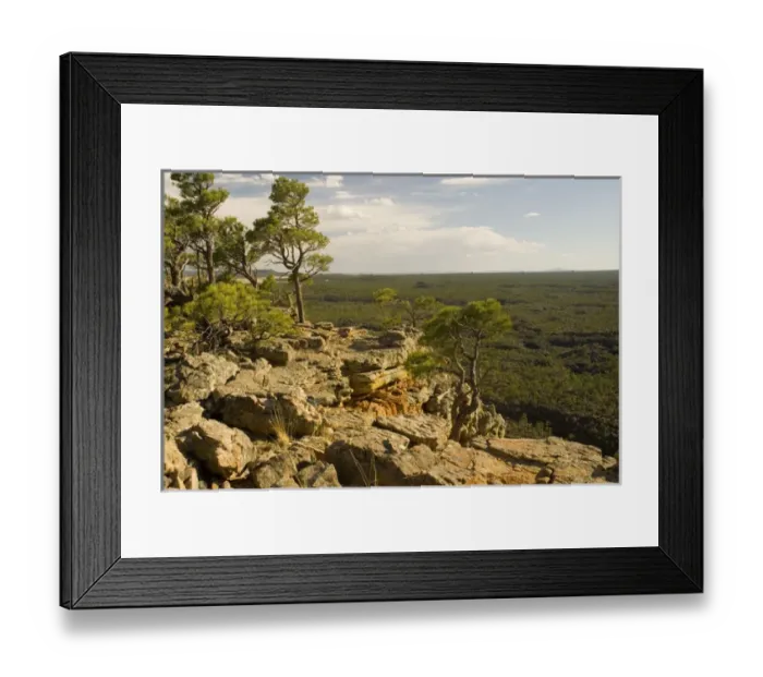 Framed Print : USA, NM, El Malpais (badlands) National Monument. Cliffs of Narrows Rim Trail overlook lava fields