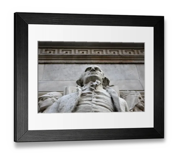 Framed Print : In New York City. Statues adorning the Washington Square arch in the West Village