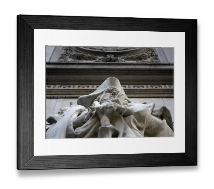 Framed Print : In New York City. Statues adorning the Washington Square arch in the West Village