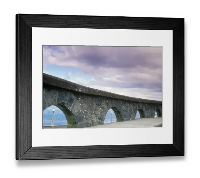 Framed Print : An arched stone rock wall frames three light posts overlooking the Columbia River Framed Print : An arched stone rock wall frames three light posts overlooking the Columbia River