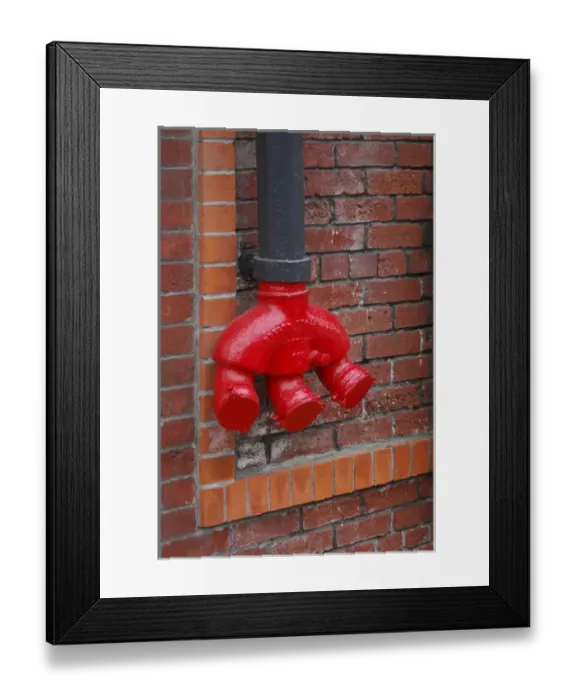 Framed Print : USA, Oregon, Portland. Bright red standpipe outside of brick building. Credit as Framed Print : USA, Oregon, Portland. Bright red standpipe outside of brick building. Credit as