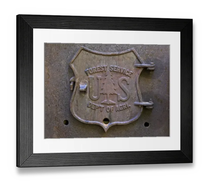 Framed Print : USA, Oregon, Rogue River National Forest. Close-up of US Forest Service plaque on fireplace door Framed Print : USA, Oregon, Rogue River National Forest. Close-up of US Forest Service plaque on fireplace door