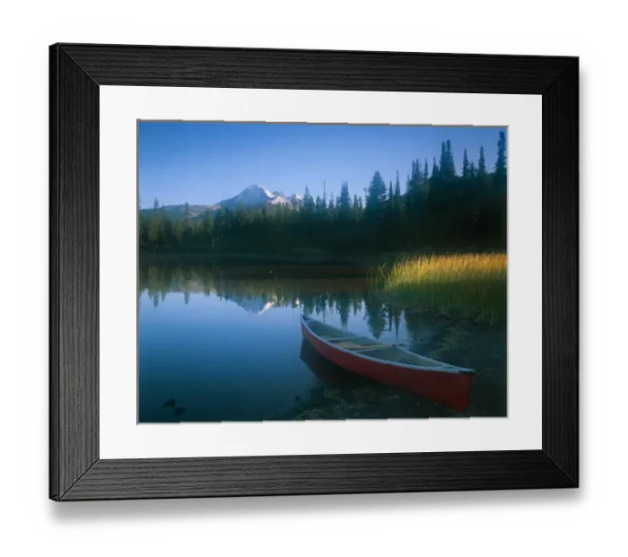 Framed Print : Red canoe pulled on shore of Sparks Lake with early morning light filtering across Framed Print : Red canoe pulled on shore of Sparks Lake with early morning light filtering across