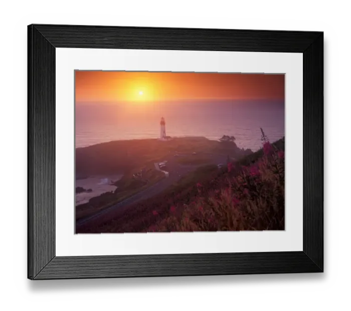 Framed Print : A golden glow sets over Yaquina Head Lighthouse as the sun sets over the ocean, Oregon Framed Print : A golden glow sets over Yaquina Head Lighthouse as the sun sets over the ocean, Oregon
