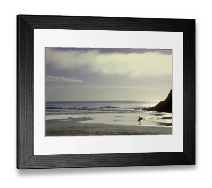 Framed Print : USA, Oregon, near Heceta Head, lone surfer going out into the Pacific Ocean