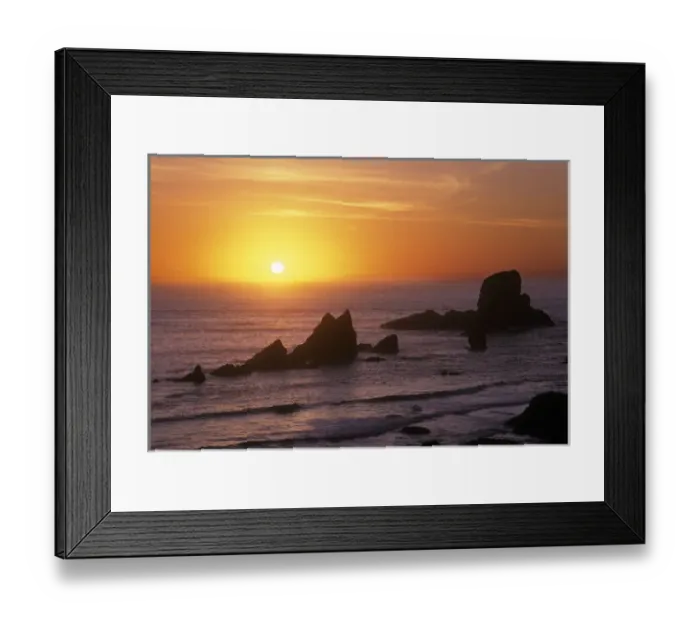 Framed Print : The sun ball sets in the orange sky and ocean at Ecola State Park, Oregon coast Framed Print : The sun ball sets in the orange sky and ocean at Ecola State Park, Oregon coast