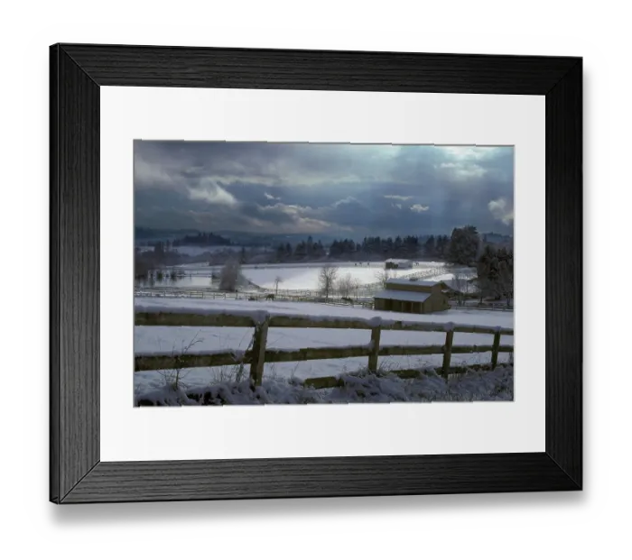 Framed Print : Shaft of light hits the snow-covered rural pasture with horses and barns near Lake Oswego Framed Print : Shaft of light hits the snow-covered rural pasture with horses and barns near Lake Oswego