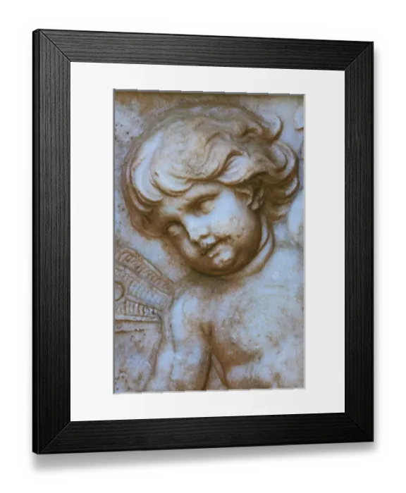 Framed Print : USA, North America; South Carolina, Charleston. A cherub on a monument in Magnolia Framed Print : USA, North America; South Carolina, Charleston. A cherub on a monument in Magnolia