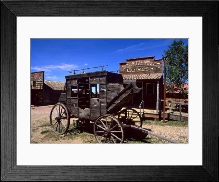 Framed Print : Stagecoach in old 1880s ghost town in Murdo South Dakota used in many movies