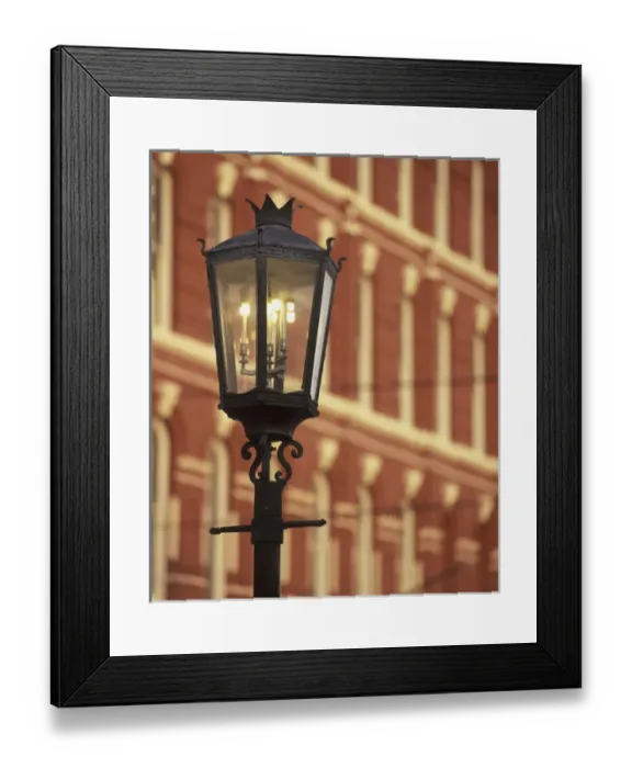 Framed Print : N. A. USA, Texas, Galveston Stuart Building (1882) and gaslight lampost at sunset